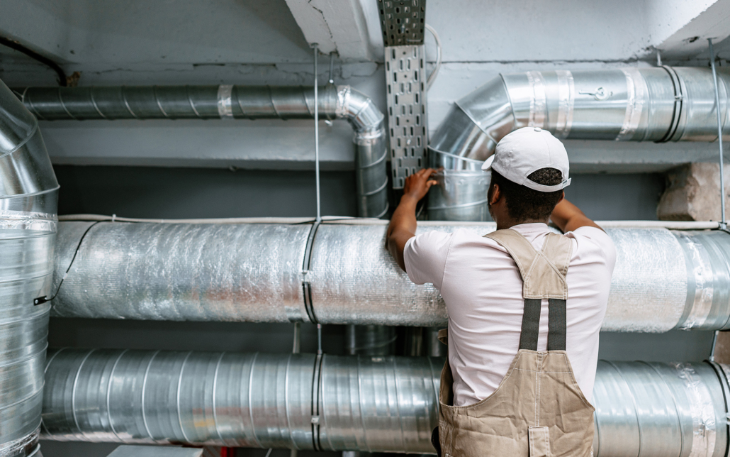 Worker Installing Hvac Duct